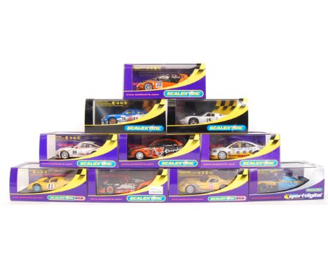 A collection of 10x original contemporary 1/32 scale Scalextric plastic racing slot cars to include; C2769 Holden Commodore, 