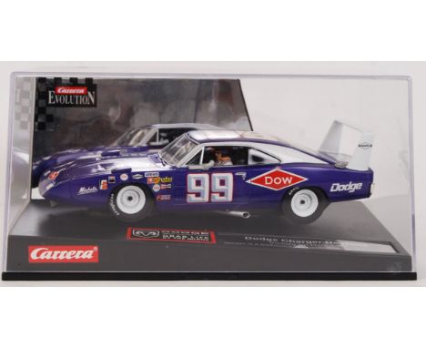 An original contemporary 1/32 scale Carrera Evolution "Dodge" 25741 Dodge Charger Daytona Victory Debut '69 plastic slot car.