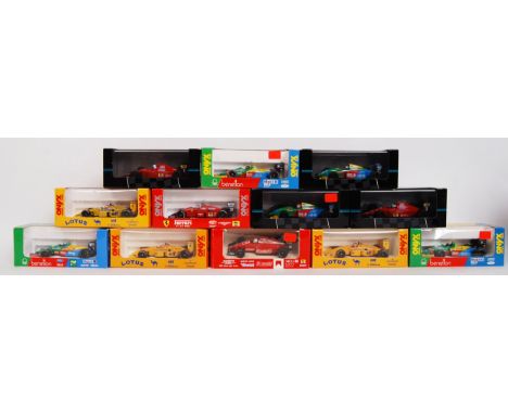 A collection of 12x original contemporary 1/43 scale diecast model F1 Formula One cars. All mint & within their original boxe