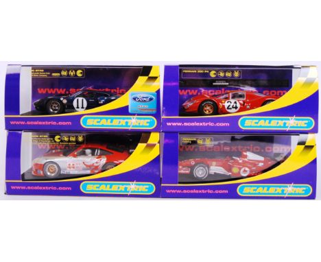 A collection of 4x original contemporary 1/32 scale Scalextric plastic racing slot cars to include; C2755 Ford GT40, C2731 Po