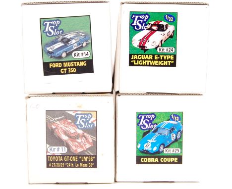 A collection of 4x original Top Slot resin 1:32 scale slot racing car kits. All unused, within the original boxes. Comprising