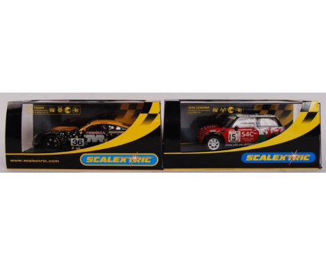 A collection of 2x original contemporary 1/32 scale Scalextric plastic racing slot cars to include; C2563 Mini Cooper & C2591