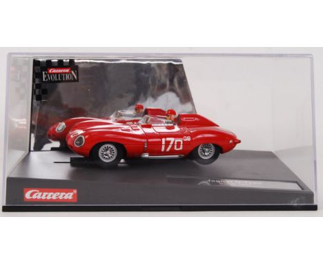 An original contemporary 1/32 scale Carrera Evolution 25709 Jaguar D-Type plastic slot car. Within its original plastic cases