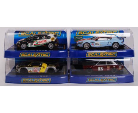 A collection of 4x original contemporary 1/32 scale Scalextric plastic racing slot cars to include; C2912 Seat Leon, C3179 Au