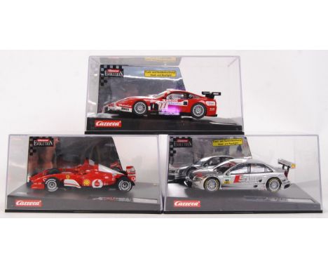 A collection of 3x original contemporary 1/32 scale Carrera Evolution plastic slot cars to include; 25753 Ferrari 575 GTC, 25