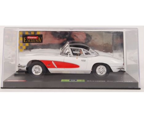 An original contemporary 1/24 scale Carrera Exclusive 20486 Chevrolet Corvette 1962 plastic slot car. Within its original pla