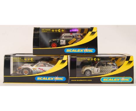 A collection of 3x original contemporary 1/32 scale Scalextric racing slot cars to include; C2579 Porsche 911 GT3R, C2562 Min