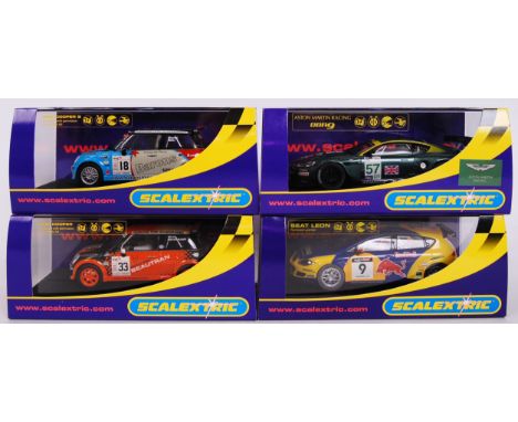 A collection of 4x original contemporary 1/32 scale Scalextric plastic racing slot cars to include; C2733 Mini Cooper S, C273