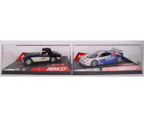 A collection of 2x original contemporary 1/32 scale Ninco plastic racing slot cars to include; Austin Healey MKIII & 50273 Mc