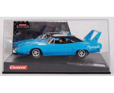 An original contemporary 1/32 scale Carrera Evolution 25721 Plymouth Roadrunner Superbird plastic slot car. Within its origin