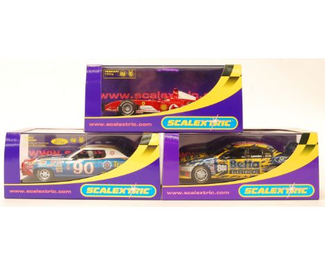 A collection of 3x original contemporary 1/32 scale Scalextric plastic slot cars to include; C2676 Ferrari F2004 no1, C2655 F