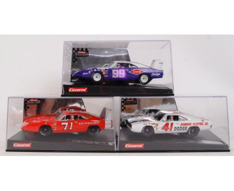 A collection of 3x original contemporary Carrera Evolution 1/32 scale plastic racing slot cars to include; 25720 Plymouth Roa