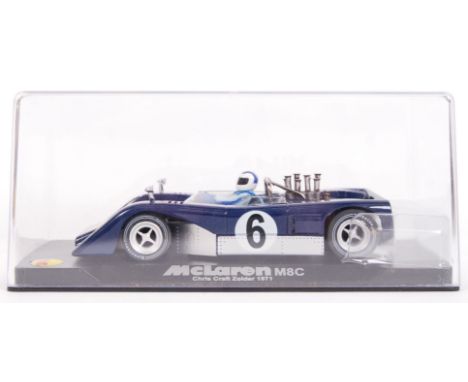 An original contemporary 1/32 scale Vanquish Mg CA54 McLaren M8C Zolder plastic slot car. Within its original plastic case. M