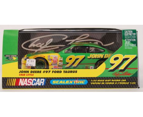 An original contemporary Scalextric Nascar 1/32 scale C2225 John Deere #97 Ford Taurus plastic slot racing car. Within origin