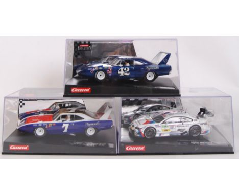 A collection of 3x original contemporary Carrera Evolution 1/32 scale plastic racing slot cars to include; 25720 Plymouth Roa