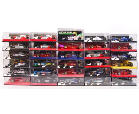 A large collection of 30x original 1/43 scale Minichamps diecast model F1 Formula One racing cars. Mint. All within their ori