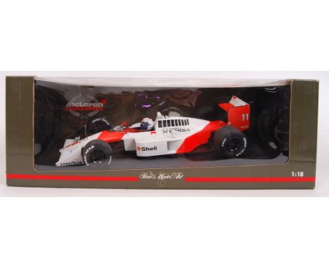 An original contemporary 1/28 scale Paul Model Art 'McLaren Collection' Minichamps F1 Formula one diecast model car. Mint wit