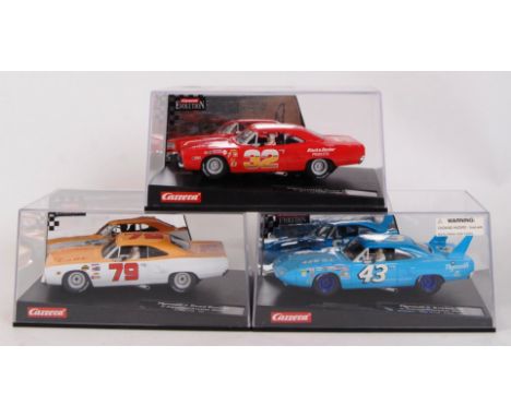 A collection of 3x original contemporary Carrera Evolution 1/32 scale plastic racing slot cars to include; 25718 Plymouth Roa