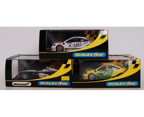 A collection of 3x original contemporary 1/32 scale Scalextric plastic racing slot cars to include; C2415 McLaren Mercedes F1