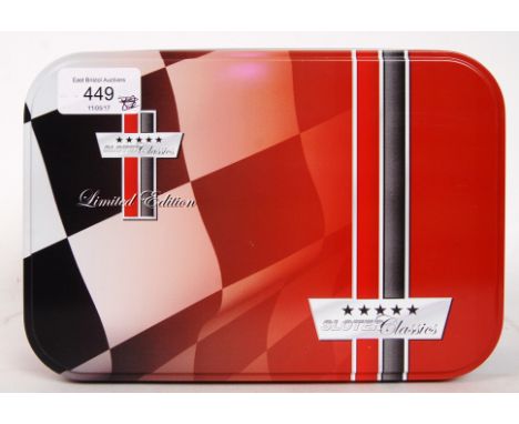 An original contemporary 1/32 scale Lola T70 Spyder (02/0308) plastic racing slot car. Within its original tin with certifica