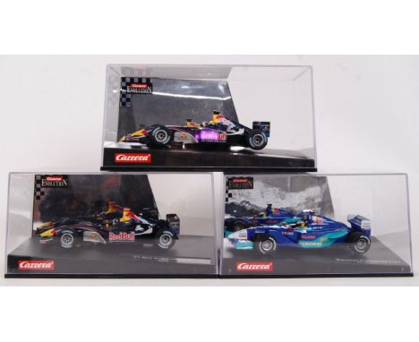 A collection of 3x original contemporary 1/32 scale Carrera Evolution plastic racing slot cars to include; 27112 F1 Red Bull 