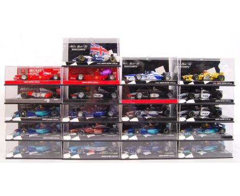 A large collection of 21x original 1/43 scale Minichamps diecast model F1 Formula One racing cars. Mint. All within their ori