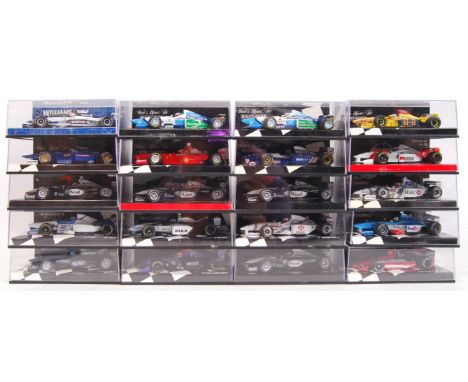 A large collection of 20x original 1/43 scale Minichamps diecast model F1 Formula One racing cars. Mint. All within their ori