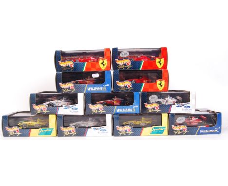 A collection of 11x original contemporary 1/43 scale Hotwheels Jordan Grand Prix & Ford Stewart Grand Prix diecast model F1 F