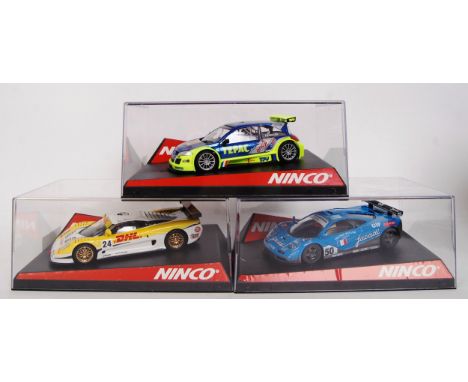 A collection of 3x original contemporary 1/32 scale Ninco plastic racing slot cars to include; 50438 Renault Megane, 50397 Mc