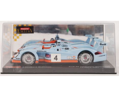 An original contemporary 1/24 scale Carrera Exclusiv 20484 Audi R8 "GULF" plastic slot car. Within its original plastic cases