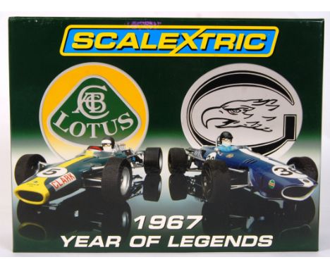 An original contemporary 1/32 scale Scalextric '1967 Year Of Legends' C2923A boxed slot car set to include; Lotus Type 49 & E