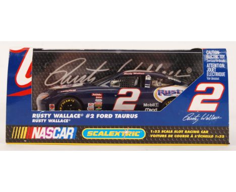 An original contemporary Scalextric Nascar 1/32 scale C2374 Rusty Wallace Ford Taurus plastic slot racing car. Within origina