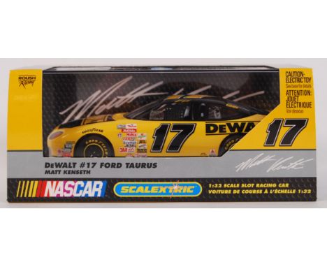 An original contemporary Scalextric Nascar 1/32 scale C2372 DeWalt #17 Ford Taurus plastic slot racing car. Within original p