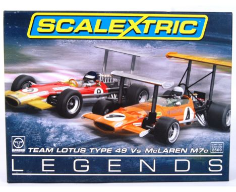 An original contemporary 1/32 scale Scalextric Team Lotus Type 49 Vs McLaren M7c Limited Edition Legends boxed set C3544A (no