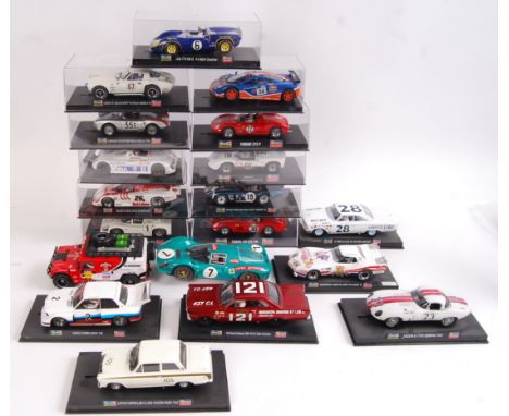 A large collection of mainly loose Revell Monogram 1/32 scale plastic racing slot cars of various models & liveries. All with