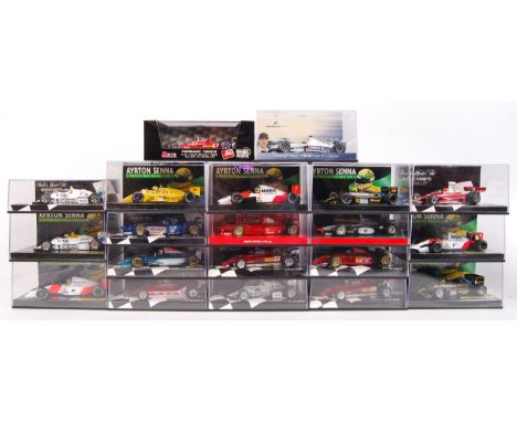 A large collection of 20x original 1/43 scale Minichamps diecast model F1 Formula One racing cars. Mint. All within their ori
