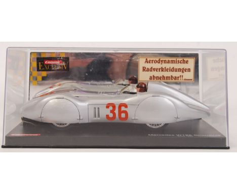 An original contemporary 1/24 scale Carrera Exclusiv 20469 Mercedes W125 Stromline "AVUS 1937" plastic slot car. Within its o