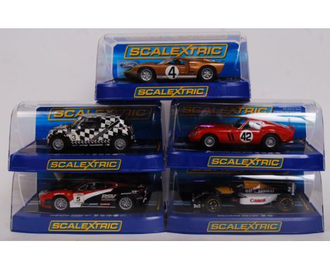 A collection of 5x original contemporary 1/32 scale Scalextric plastic racing slot cars to include; C2911 Mini Cooper, C2938 