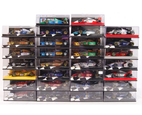 A large collection of 30x original 1/43 scale Minichamps diecast model F1 Formula One racing cars. Mint. All within their ori