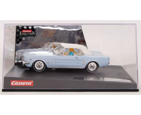 An original contemporary 1/32 scale Carrera Evolution 25738 James Bond 007 Thunderball  Ford Mustang Convertible. Within its 