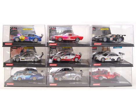 A collection of 9x original contemporary 1/32 scale Carrera Evolution plastic racing slot cars to include; 27127 Audi, 77117 