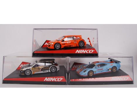 A collection of 3x original contemporary 1/32 scale Ninco plastic racing slot cars to include; 50437 Renault Megane, 50428 Mo