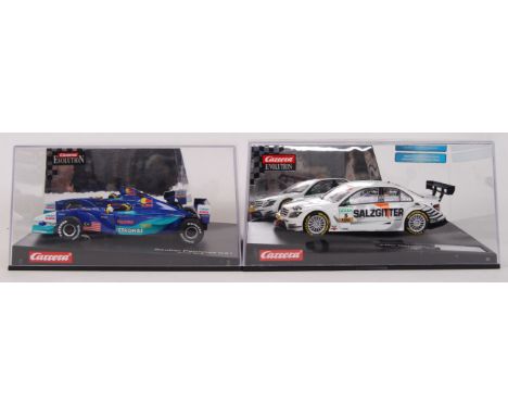 A collection of 2x original contemporary 1/32 scale Carrera Evolution plastic racing slot cars to include; 27234 AMG-Mercedes