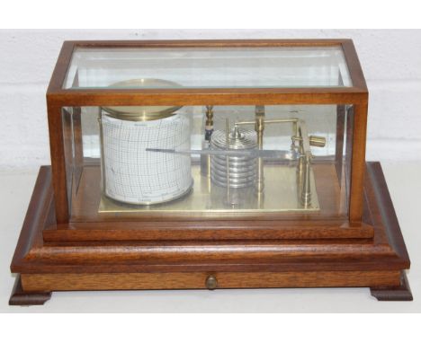 A superb quality Mahogany cased barograph by Gluck, 20th century with a huge qty of both new and used charts with other paper