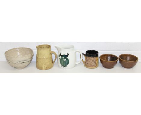 6 pieces of assorted studio and art pottery to include a cow decorated milk jug by Arabia of Finland, a further art pottery b