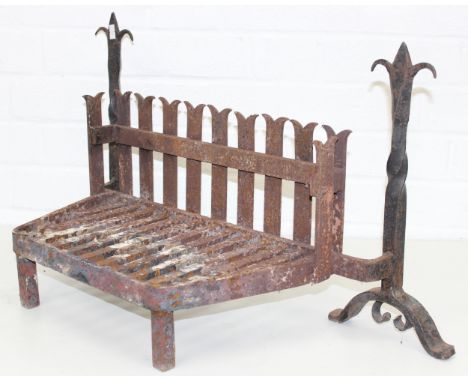 A vintage wrought iron fire grate or basket, 70cm wide