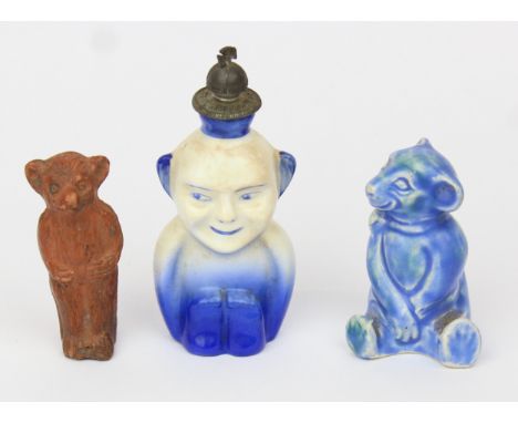 A rare C.H. Brannam of Barum blue glazed model of a teddy bear, marked to base, 55mm tall, an unusual porcelain scent bottle 