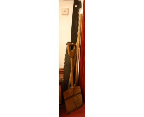 Assorted bygone tools to include malt shovel and lumberjack saws; together with a pair of reproduction prints of agricultural