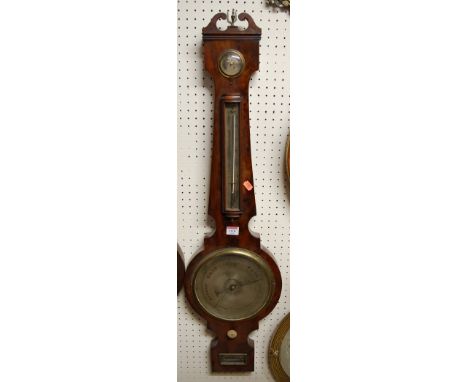 A William IV mahogany four dial wheel barometer