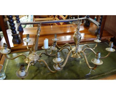 A contemporary Dutch style seven light hanging electrolier, together with a smaller five light example (2)
